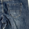 Стильные теплые джинсы с сильными потертостями 84070428